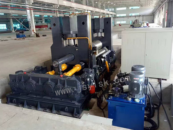 水平下(xià)調式卷(juan)闆機